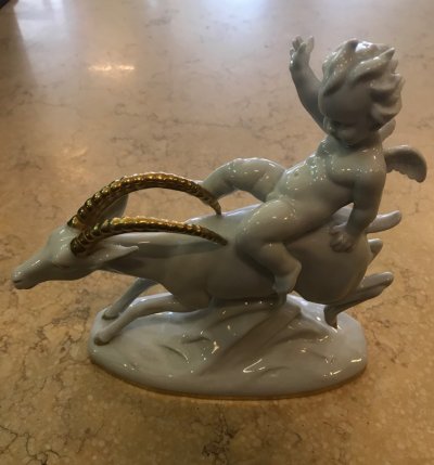 Putti na kozorožcovi