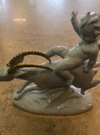 Putti na kozorožcovi