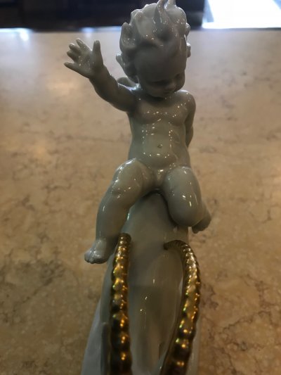 Putti na kozorožcovi
