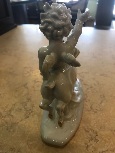 Putti na kozorožcovi